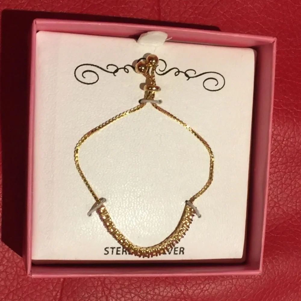 Sterling silver adjustable bracelet. With box/tag